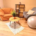 Orange Couch Apartment