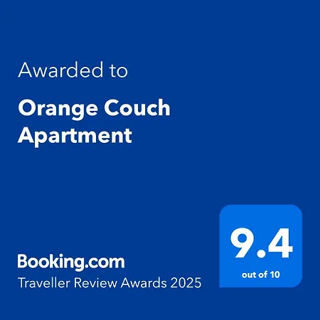 Orange Couch Apartment